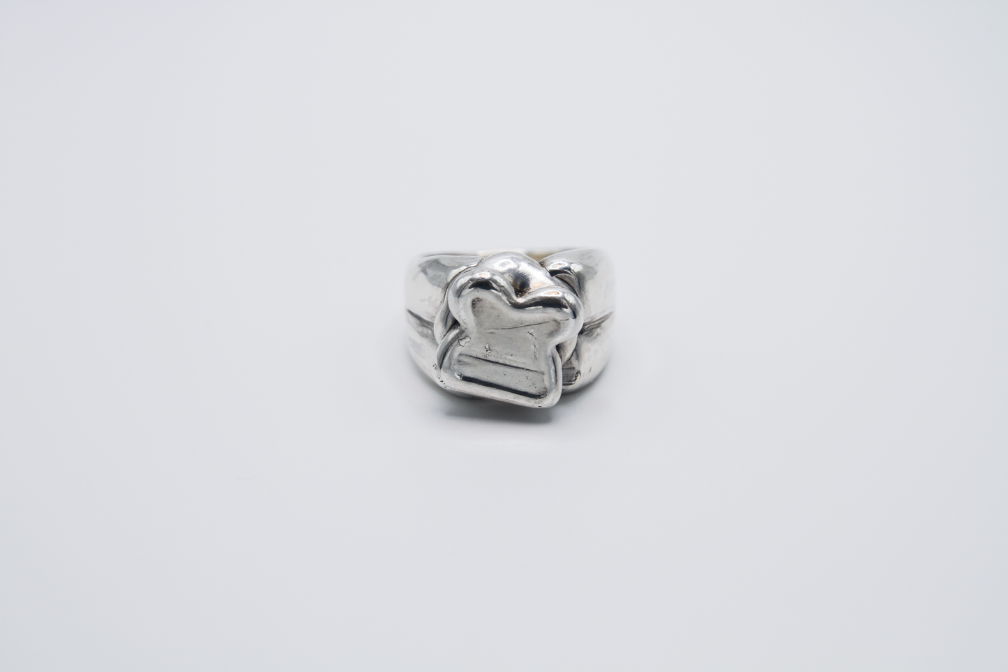 The Honey Sandwich Ring. 925 Solid Sterling Silver Chunky Ring hand made in the United Kingdom. This ring carries the design of a honey sandwich with sterling silver honey oozing out the sides. For all genders and ring sizes.