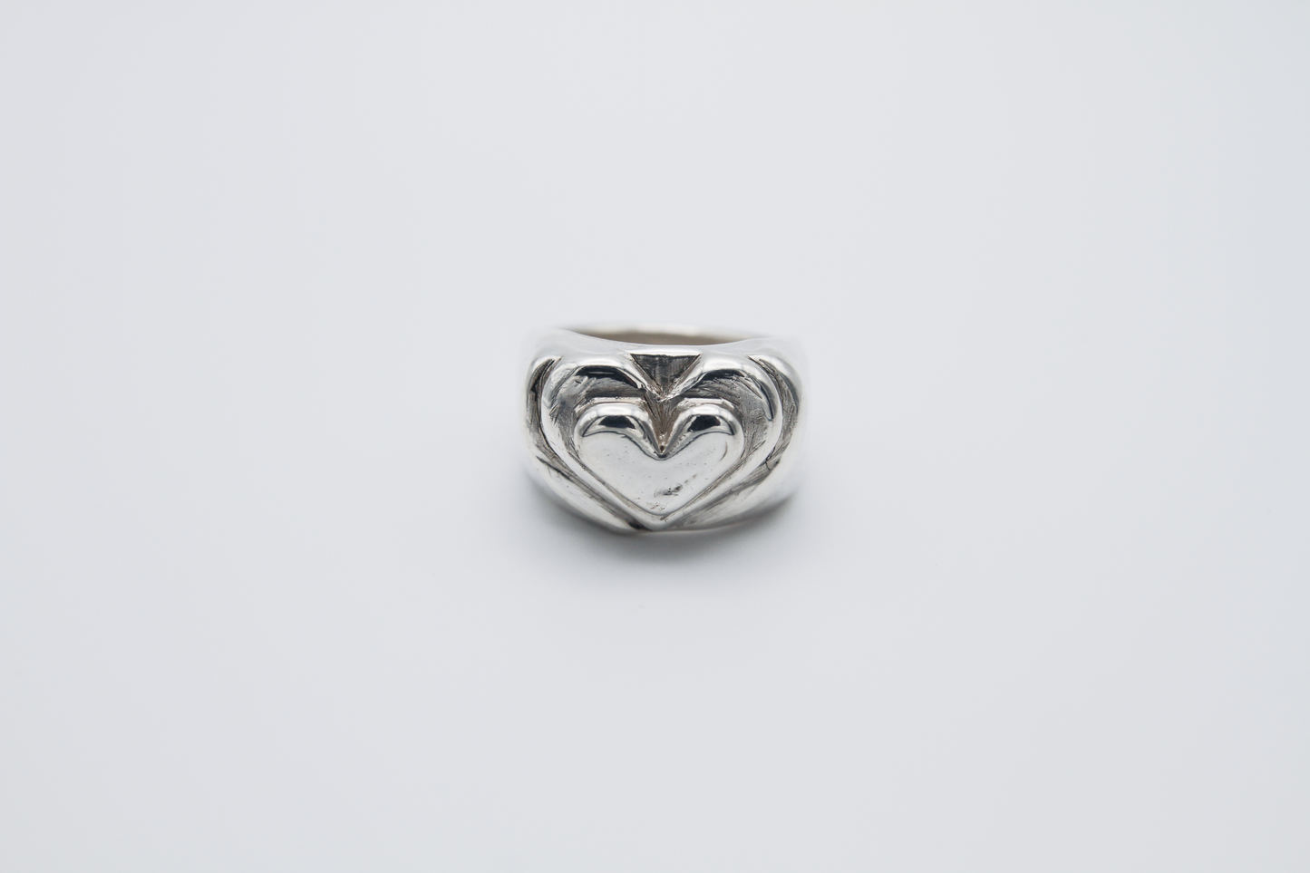 The Hill of Hearts Ring. 925 Solid Sterling Silver Chunky Ring hand made in the United Kingdom. This ring is made up of 3 tiers in a heart shape carved by hand from wax and then cast into sterling silver. For all genders and ring sizes.
