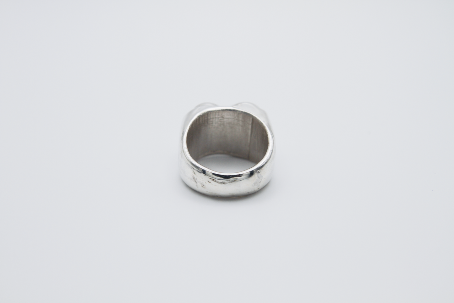 The Hill of Hearts Ring. 925 Solid Sterling Silver Chunky Ring hand made in the United Kingdom. This ring is made up of 3 tiers in a heart shape carved by hand from wax and then cast into sterling silver. For all genders and ring sizes.