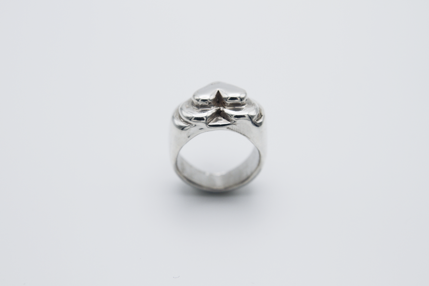 The Hill of Hearts Ring. 925 Solid Sterling Silver Chunky Ring hand made in the United Kingdom. This ring is made up of 3 tiers in a heart shape carved by hand from wax and then cast into sterling silver. For all genders and ring sizes.