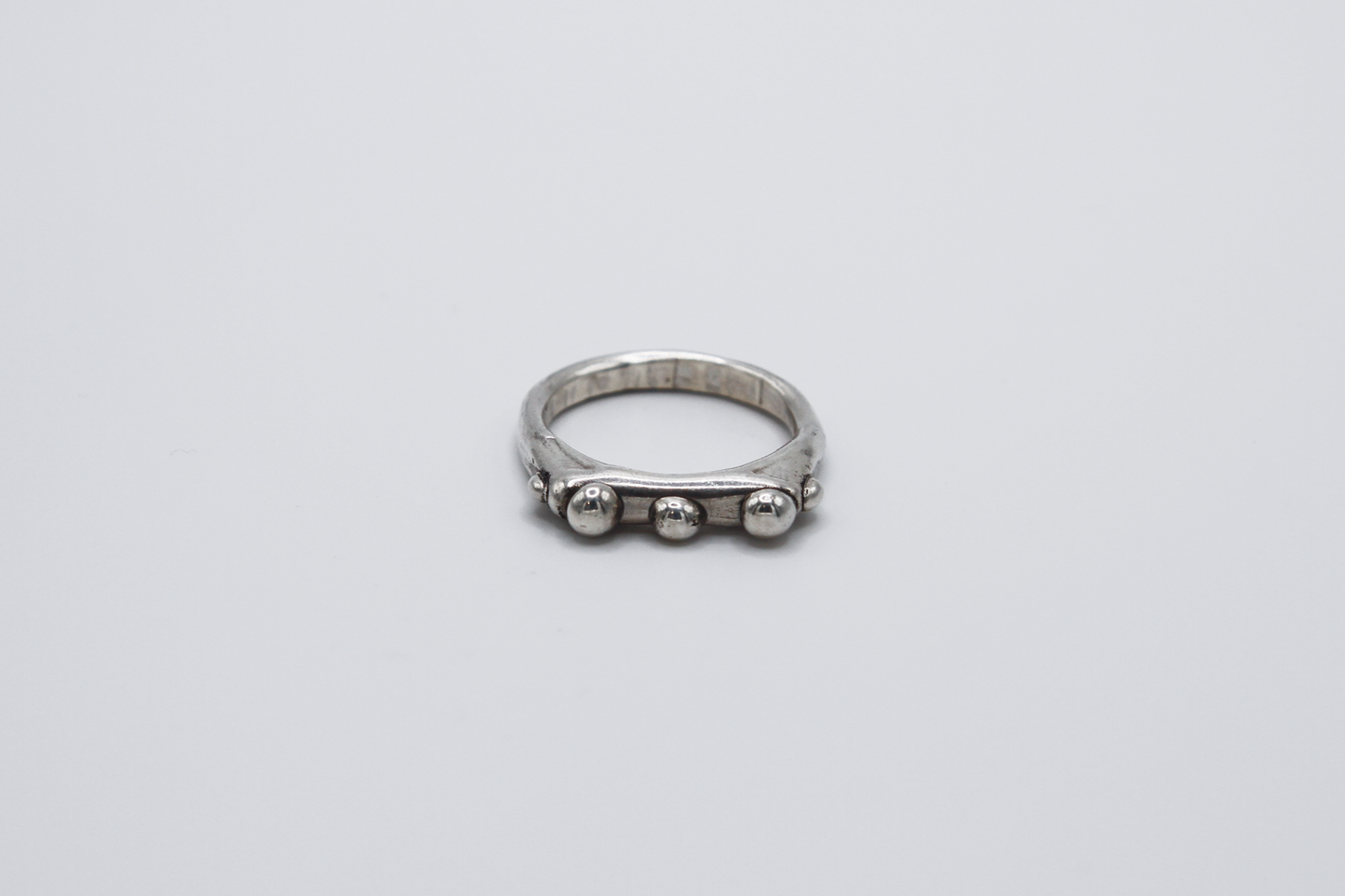 The Dew Drop Signet Ring Stack. 925 Solid Sterling Silver Chunky Ring band hand made in the United Kingdom. These stacking rings fashion blobs and drops of sterling silver in a bespoke and organic deisgn. Stack these three rings however you like, to be worn together or separately. For all genders and ring sizes.