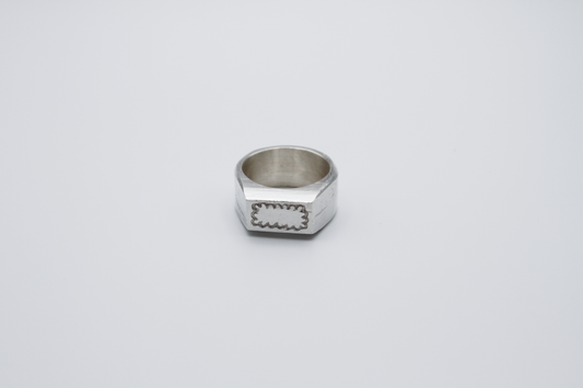 The Doodle Signet Ring. 925 Solid Sterling Silver Chunky Ring band hand made in the United Kingdom. This ring has a classic flat face displaying a wiggly and unique doodle design in the shape of a box on the front of the ring. For all genders and ring sizes.