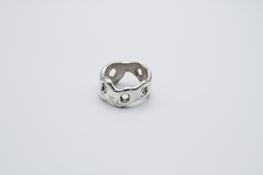 The Honeycomb Ring. 925 Solid Sterling Silver Chunky Ring band hand made in the United Kingdom. This ring has a melted look to it, with windows and eyelets throughout. For all genders and ring sizes.