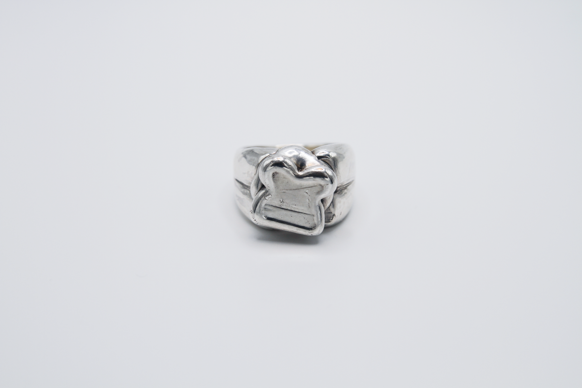 The Honey Sandwich Ring. 925 Solid Sterling Silver Chunky Ring hand made in the United Kingdom. This ring carries the design of a honey sandwich with sterling silver honey oozing out the sides. For all genders and ring sizes.