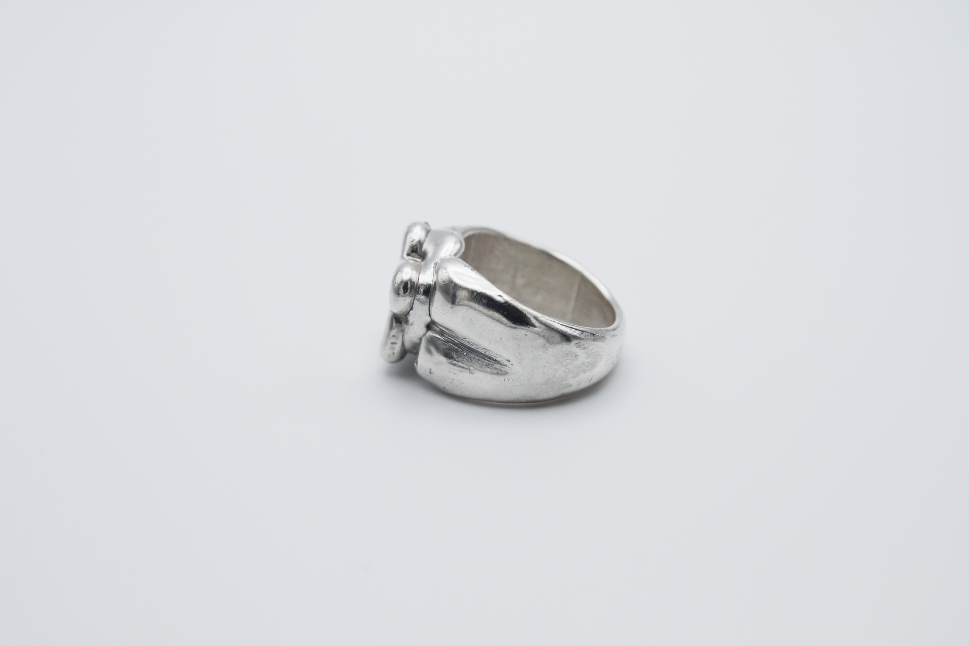 The Honey Sandwich Ring. 925 Solid Sterling Silver Chunky Ring hand made in the United Kingdom. This ring carries the design of a honey sandwich with sterling silver honey oozing out the sides. For all genders and ring sizes.