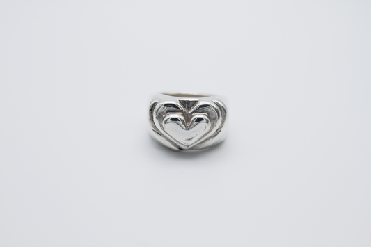 The Hill of Hearts Ring. 925 Solid Sterling Silver Chunky Ring hand made in the United Kingdom. This ring is made up of 3 tiers in a heart shape carved by hand from wax and then cast into sterling silver. For all genders and ring sizes.